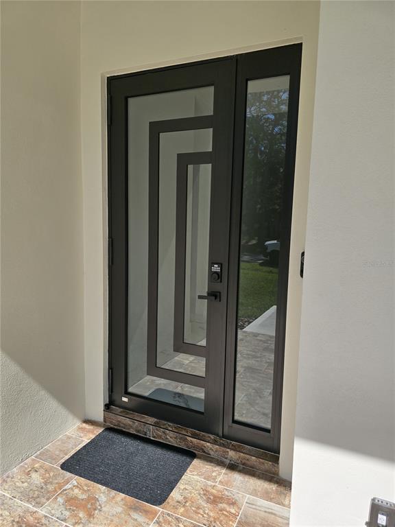 5823 Whippoorwill Drive Tampa, FL 33625 - Photo 3 of 31 a view of a entryway of the house