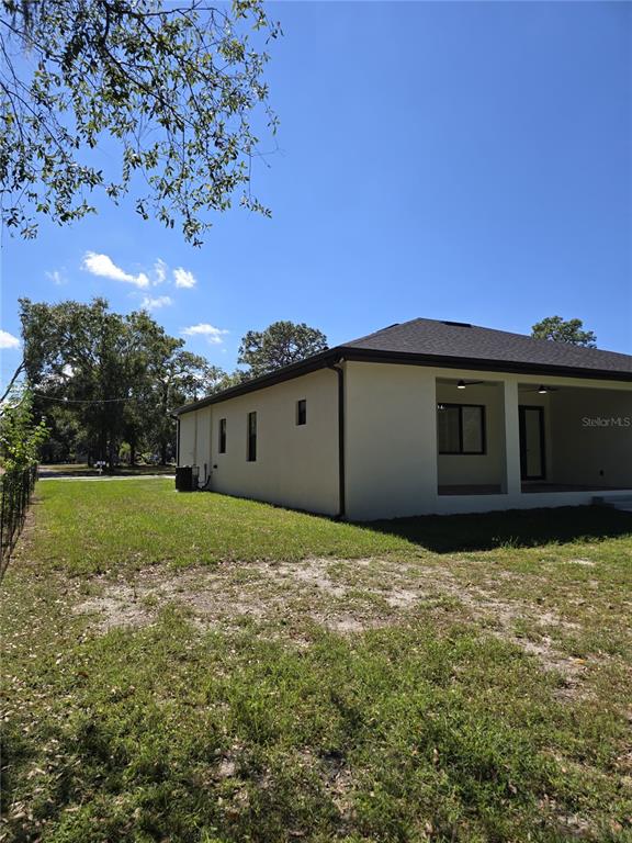 5823 Whippoorwill Drive Tampa, FL 33625 - Photo 31 of 31 a house view with a garden space