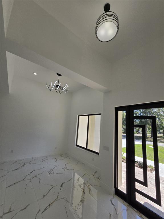 5823 Whippoorwill Drive Tampa, FL 33625 - Photo 4 of 31 a view of a room with window and air conditioner