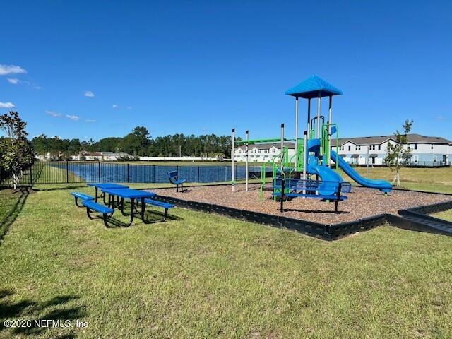 3597 Prancer Point Middleburg, FL 32068 - Photo 29 of 38 a view of a swimming pool with a table and chairs