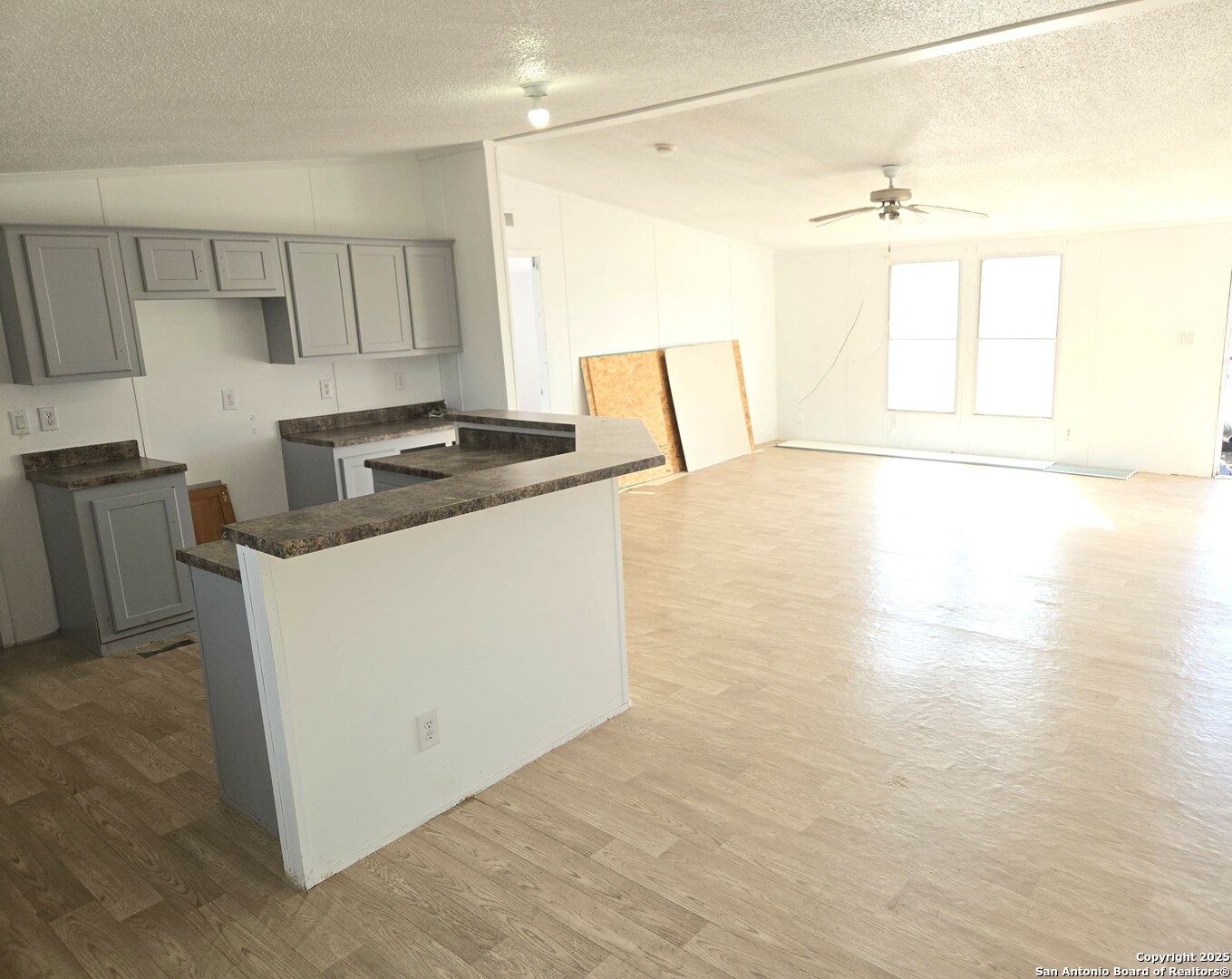 4124 Farmview Loop Converse, TX 78109 - Photo 9 of 19 a kitchen with a stove a refrigerator and a sink