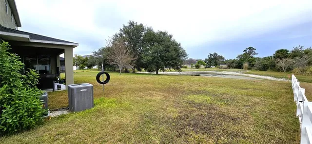 a view of a garden with an outdoor space