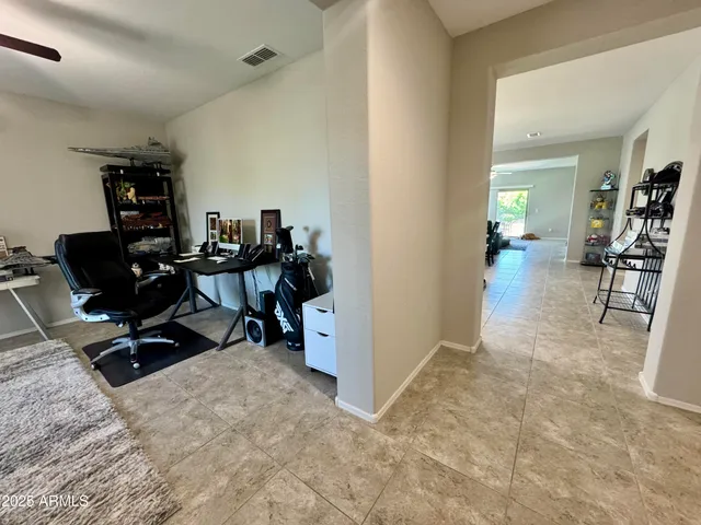 a view of a workspace with furniture