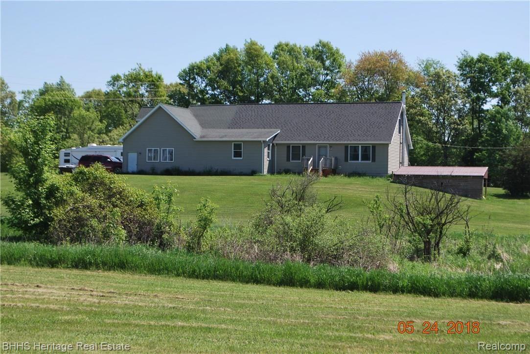 3300 Cemetery Road Fowlerville, MI 48836 - Photo 4 of 41 Looking at the front of the home