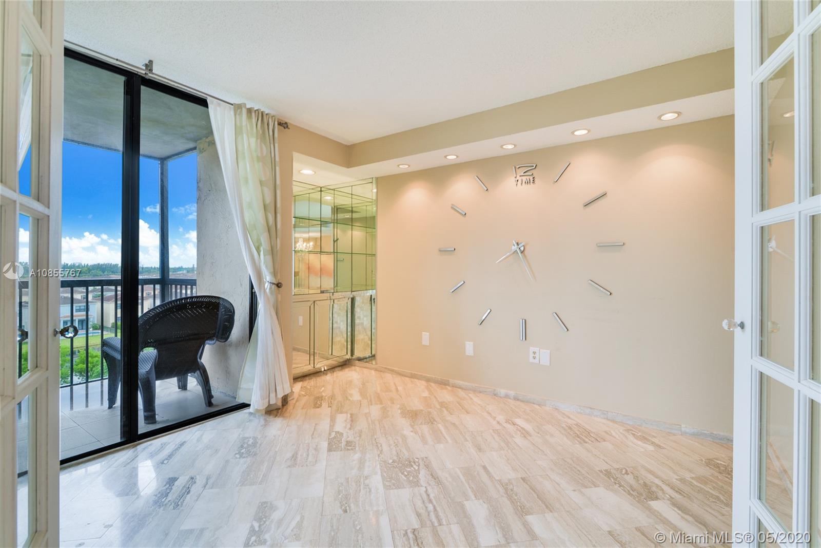 900 Northeast 195th Street, Unit 610 Miami, FL 33179 - Photo 2 of 15 Third bedroom converted into a Den with french doors