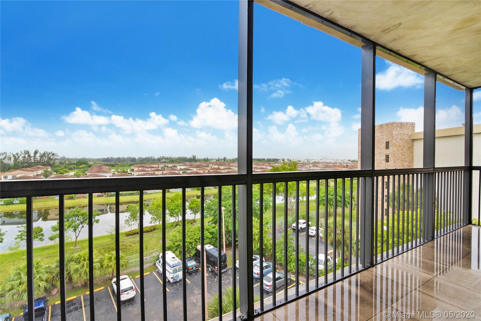 900 Northeast 195th Street, Unit 610 Miami, FL 33179 - Photo 13 of 15 Wide balcony with open view