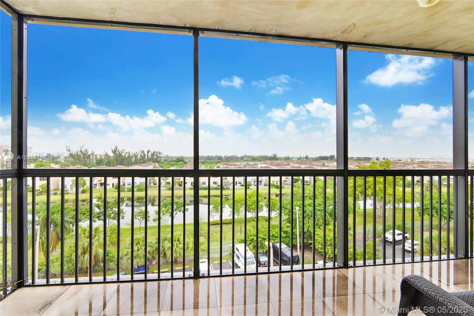 900 Northeast 195th Street, Unit 610 Miami, FL 33179 - Photo 14 of 15 Wide balcony with open view.