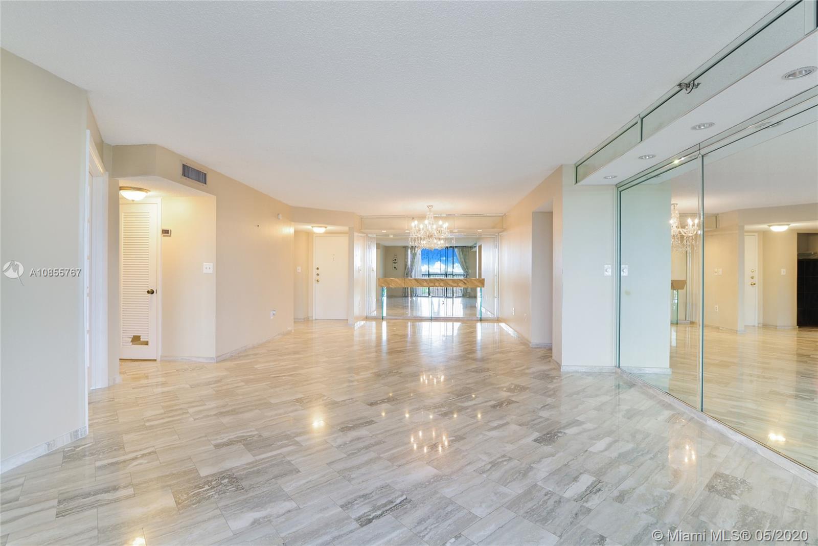 900 Northeast 195th Street, Unit 610 Miami, FL 33179 - Photo 3 of 15 Large living and dining room