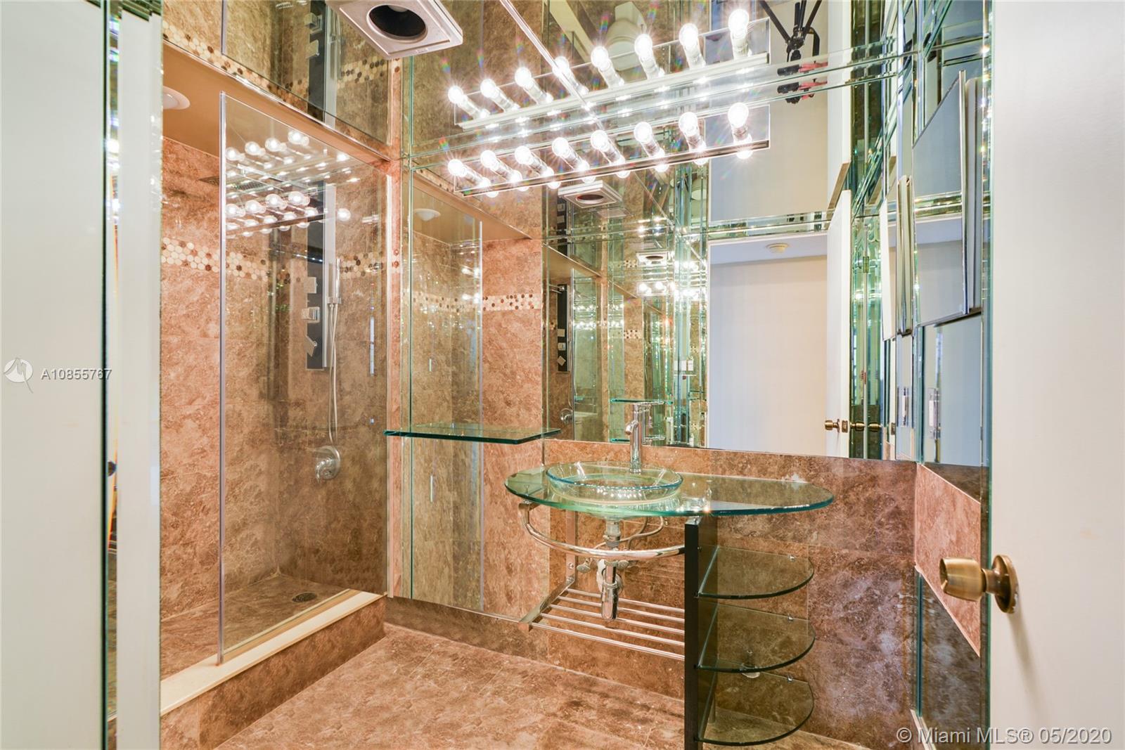 900 Northeast 195th Street, Unit 610 Miami, FL 33179 - Photo 7 of 15 Renovated second bathroom.