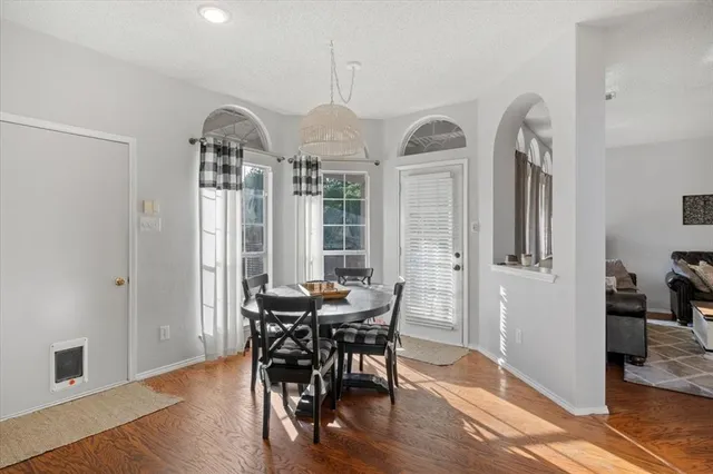 a view of a livingroom with furniture and window