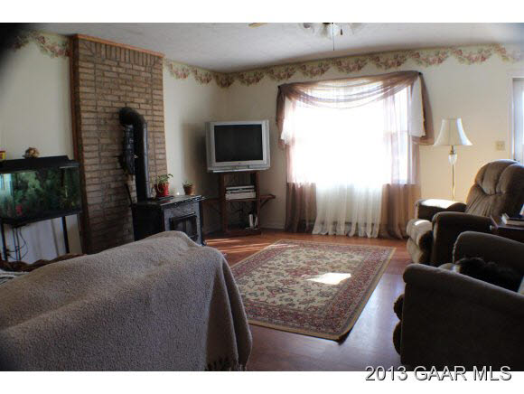 54 Buckboard Road Waynesboro, VA 22980 - Photo 3 of 9 a bedroom with a bed and a television