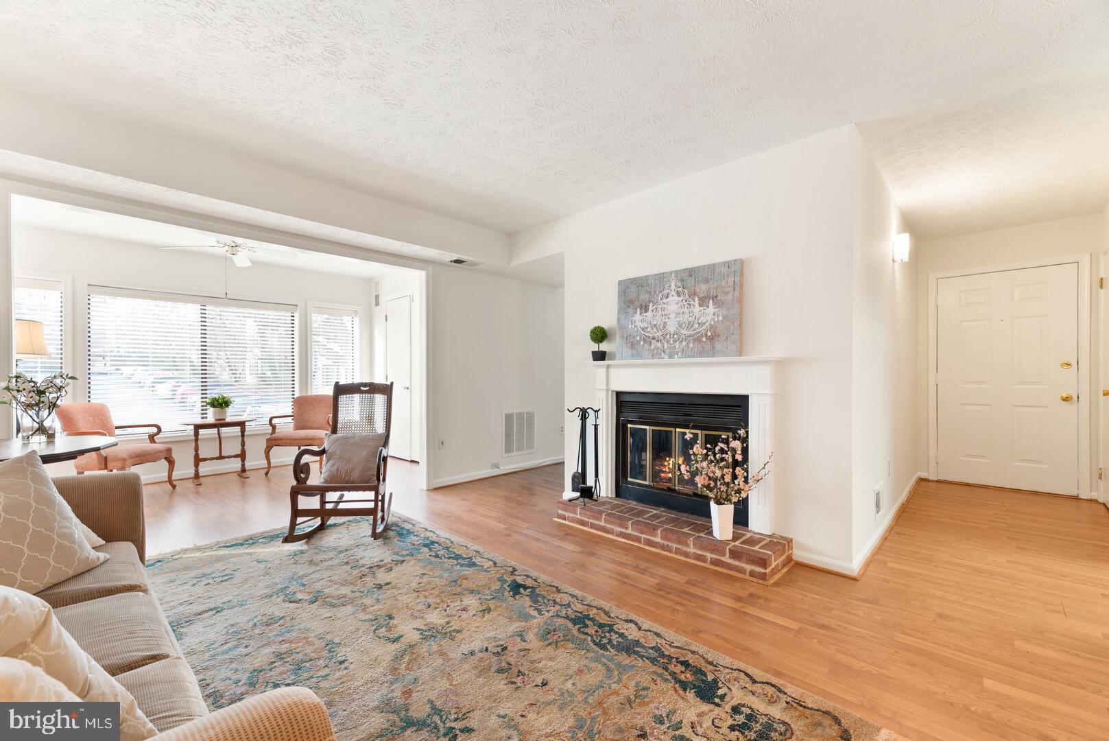 2225 Hunter's Run Drive Reston, VA 20191 - Photo 10 of 26 Large open living area w/ wood burning fireplace