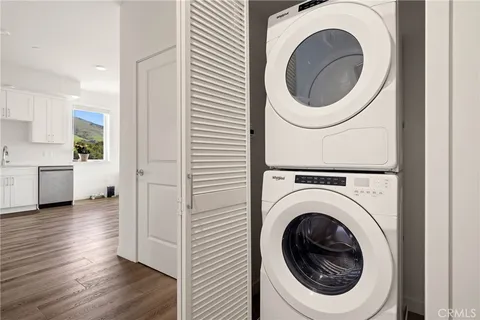 a balcony with table and chairs