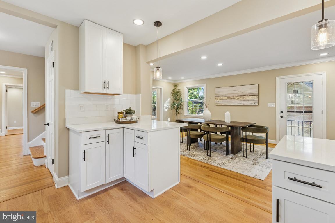 1901 Belle Haven Road Alexandria, VA 22307 - Photo 12 of 52 a kitchen with white cabinets and counter space