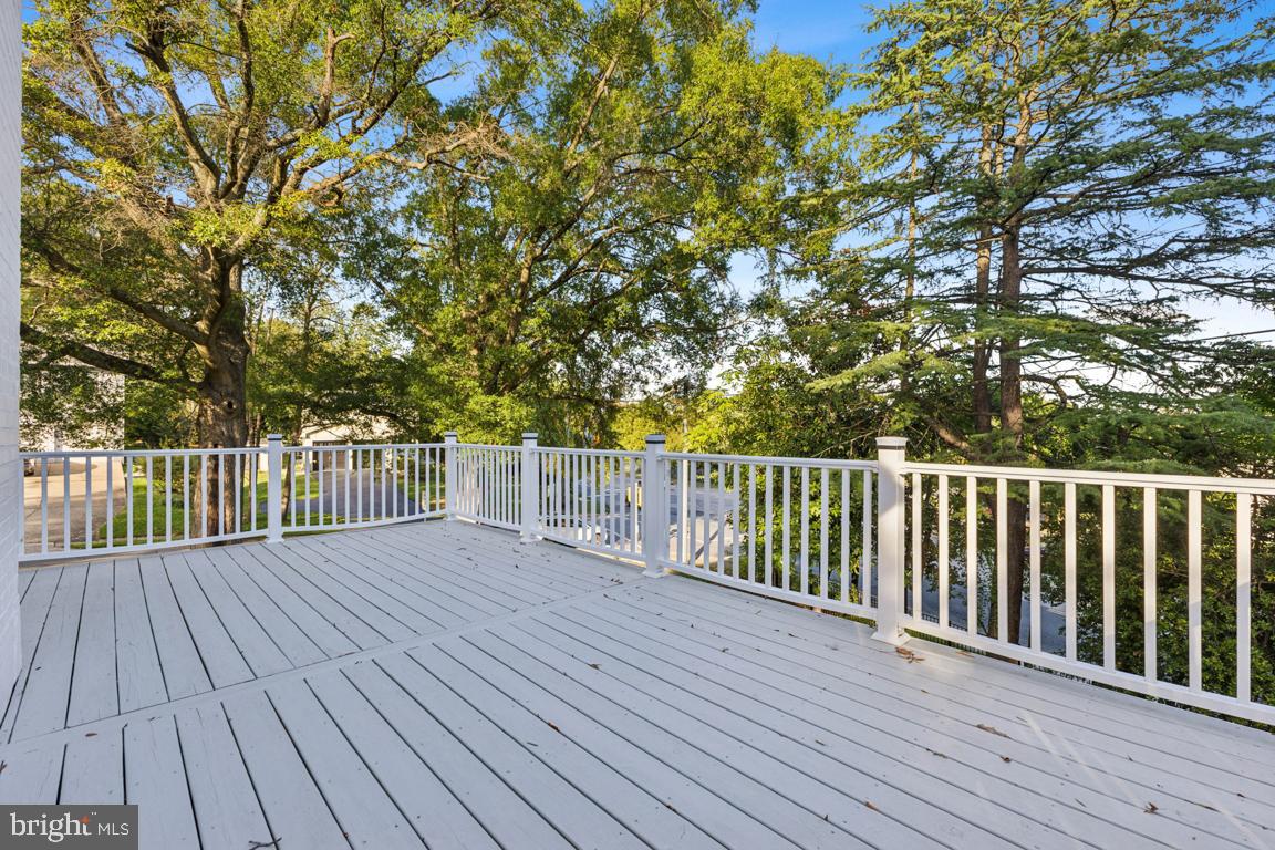 1901 Belle Haven Road Alexandria, VA 22307 - Photo 27 of 52 a view of deck with wooden floor and fence