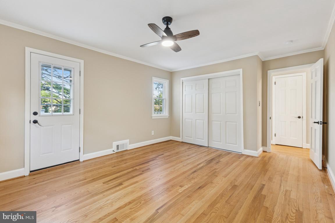 1901 Belle Haven Road Alexandria, VA 22307 - Photo 29 of 52 wooden floor in an empty room with a window