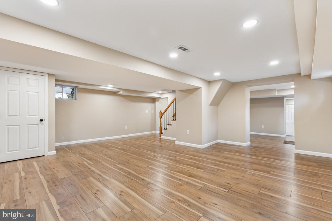 1901 Belle Haven Road Alexandria, VA 22307 - Photo 35 of 52 a view of an empty room with wooden floor