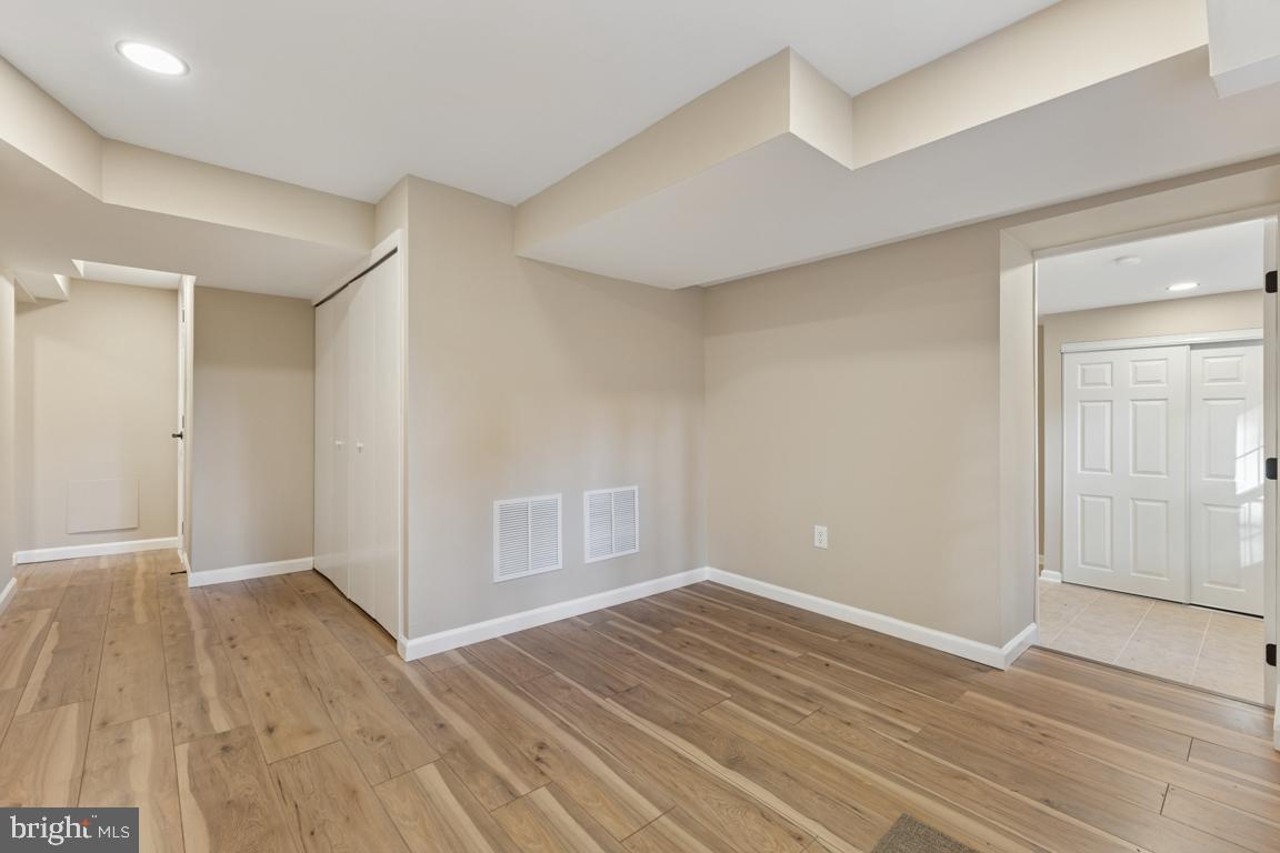 1901 Belle Haven Road Alexandria, VA 22307 - Photo 36 of 52 wooden floor in an empty room