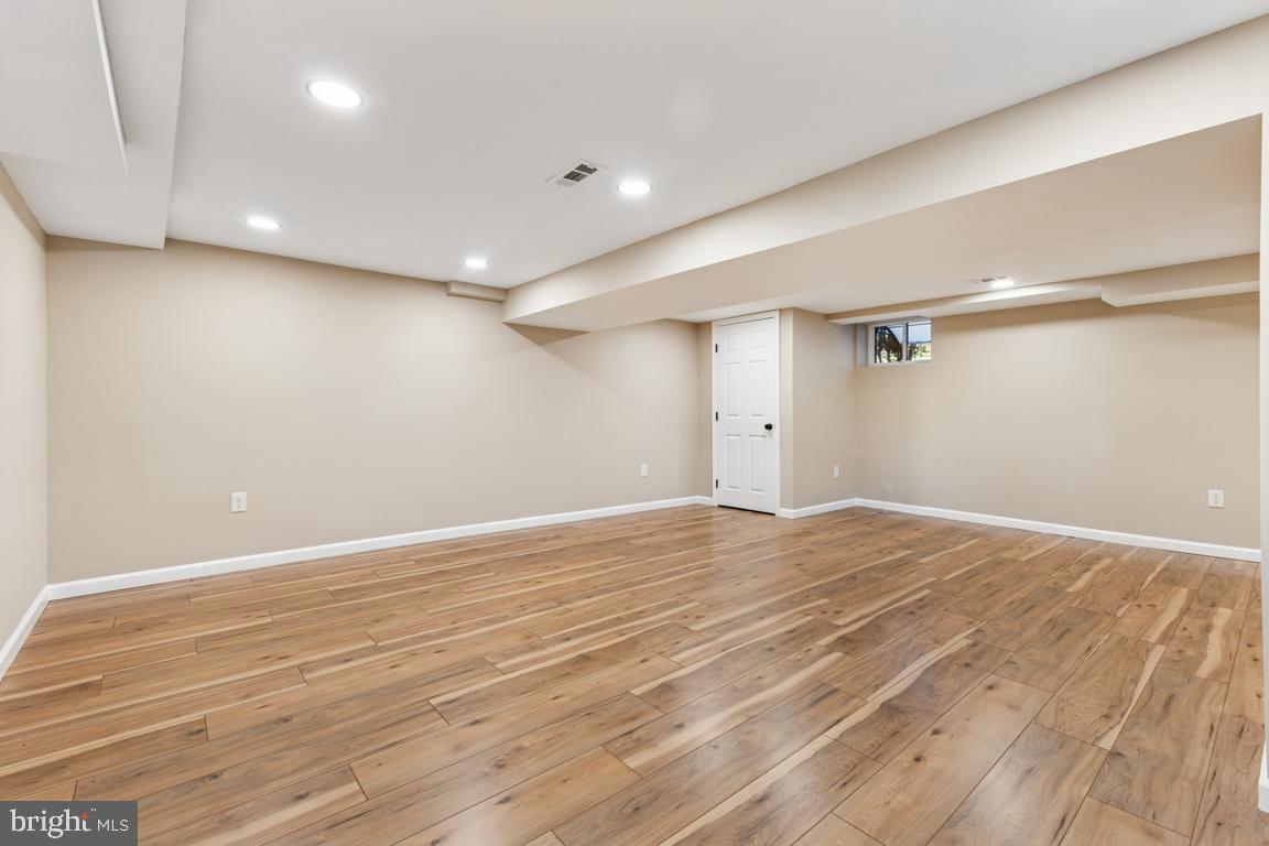 1901 Belle Haven Road Alexandria, VA 22307 - Photo 39 of 52 a view of empty room with wooden floor