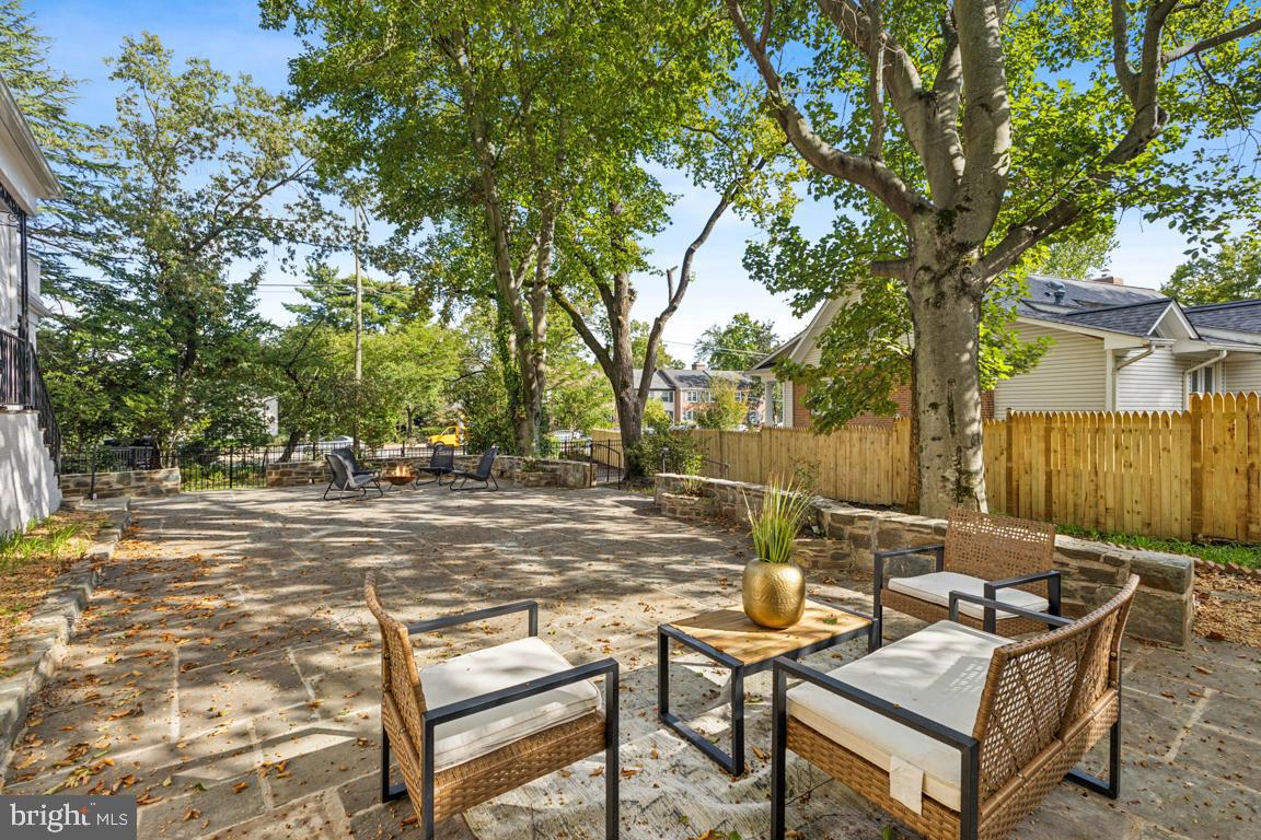 1901 Belle Haven Road Alexandria, VA 22307 - Photo 41 of 52 a backyard of a house with table and chairs