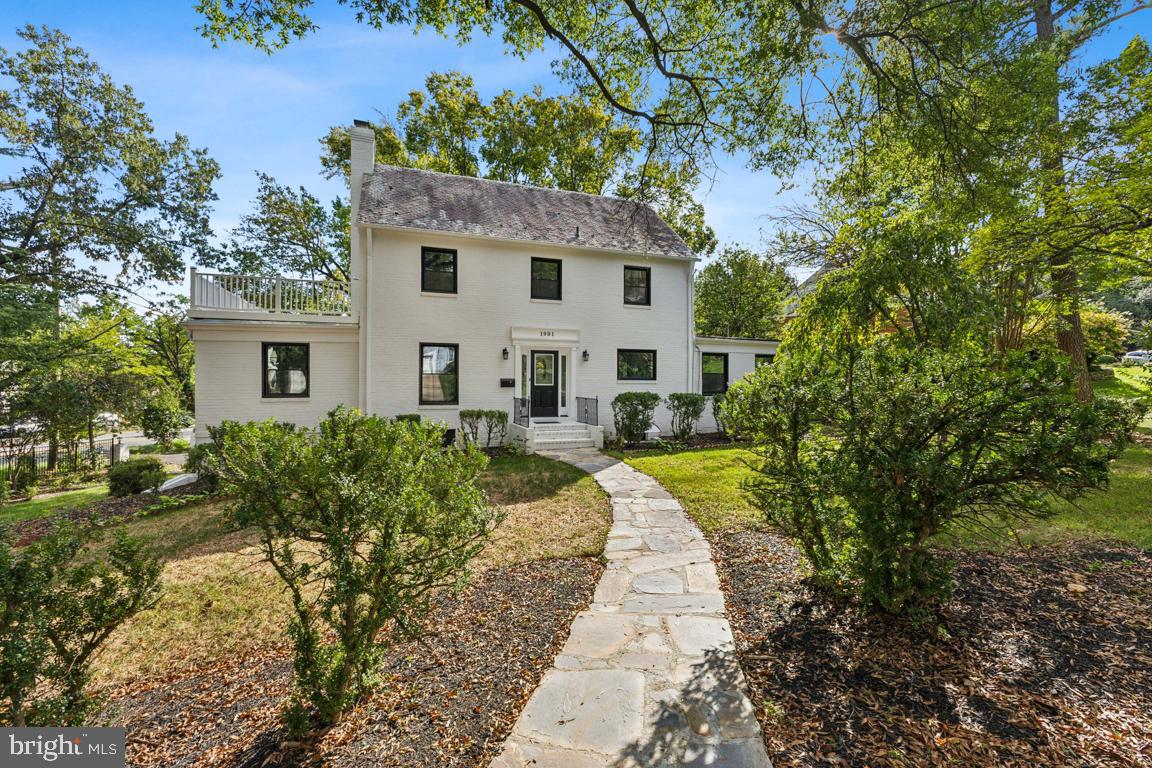 1901 Belle Haven Road Alexandria, VA 22307 - Photo 48 of 52 a front view of a house with a yard