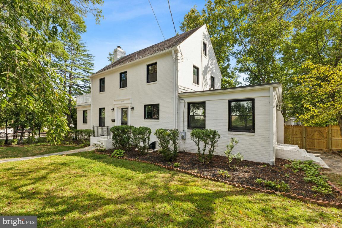 1901 Belle Haven Road Alexandria, VA 22307 - Photo 50 of 52 a view of house with yard and sitting area