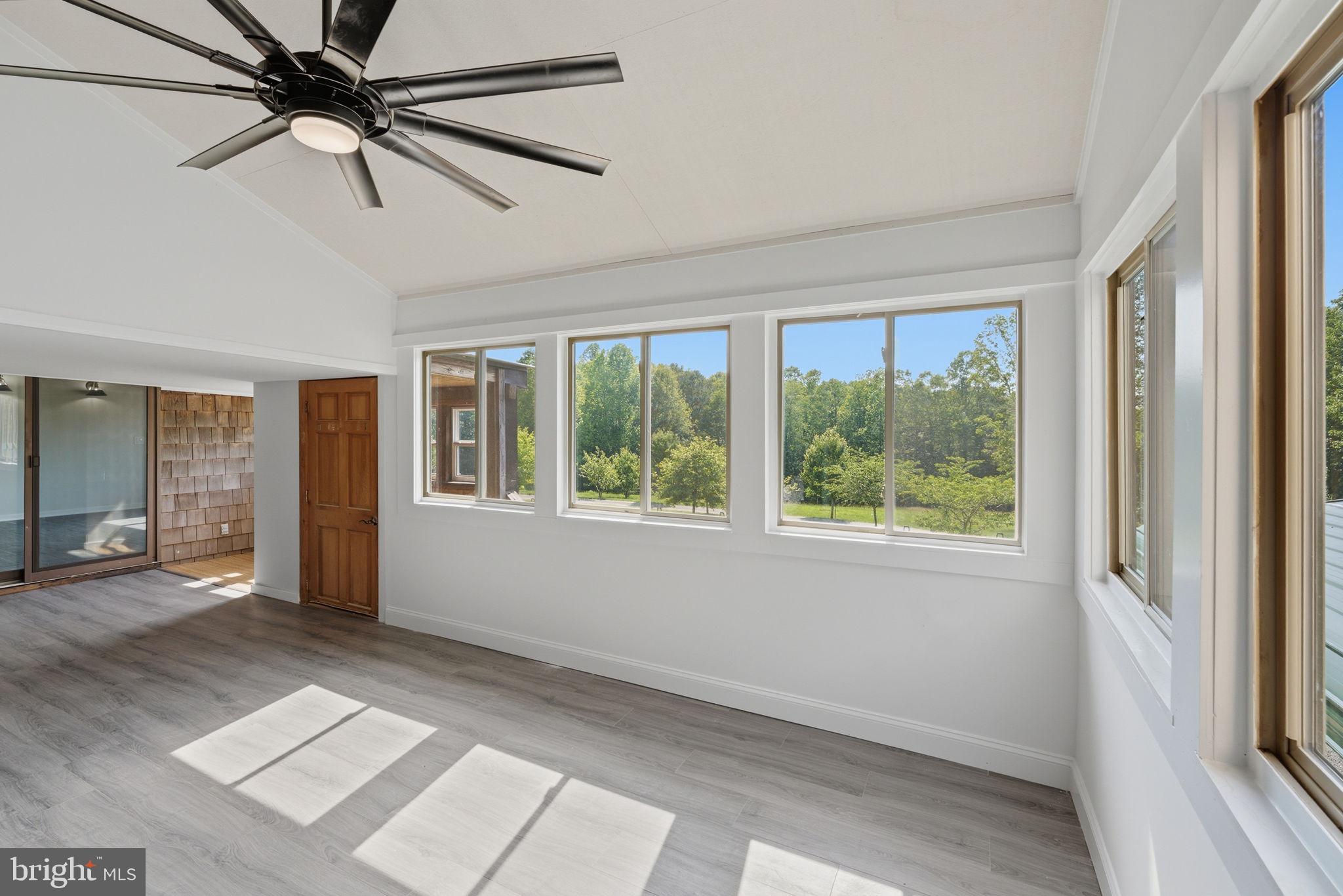 7522 Stubbs Bridge Road Spotsylvania, VA 22551 - Photo 18 of 60 a view of an empty room with a window