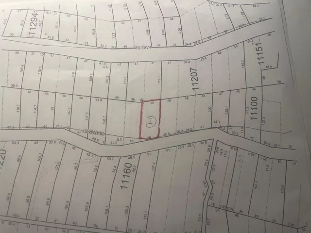 a view of a utility room with racks on the wall