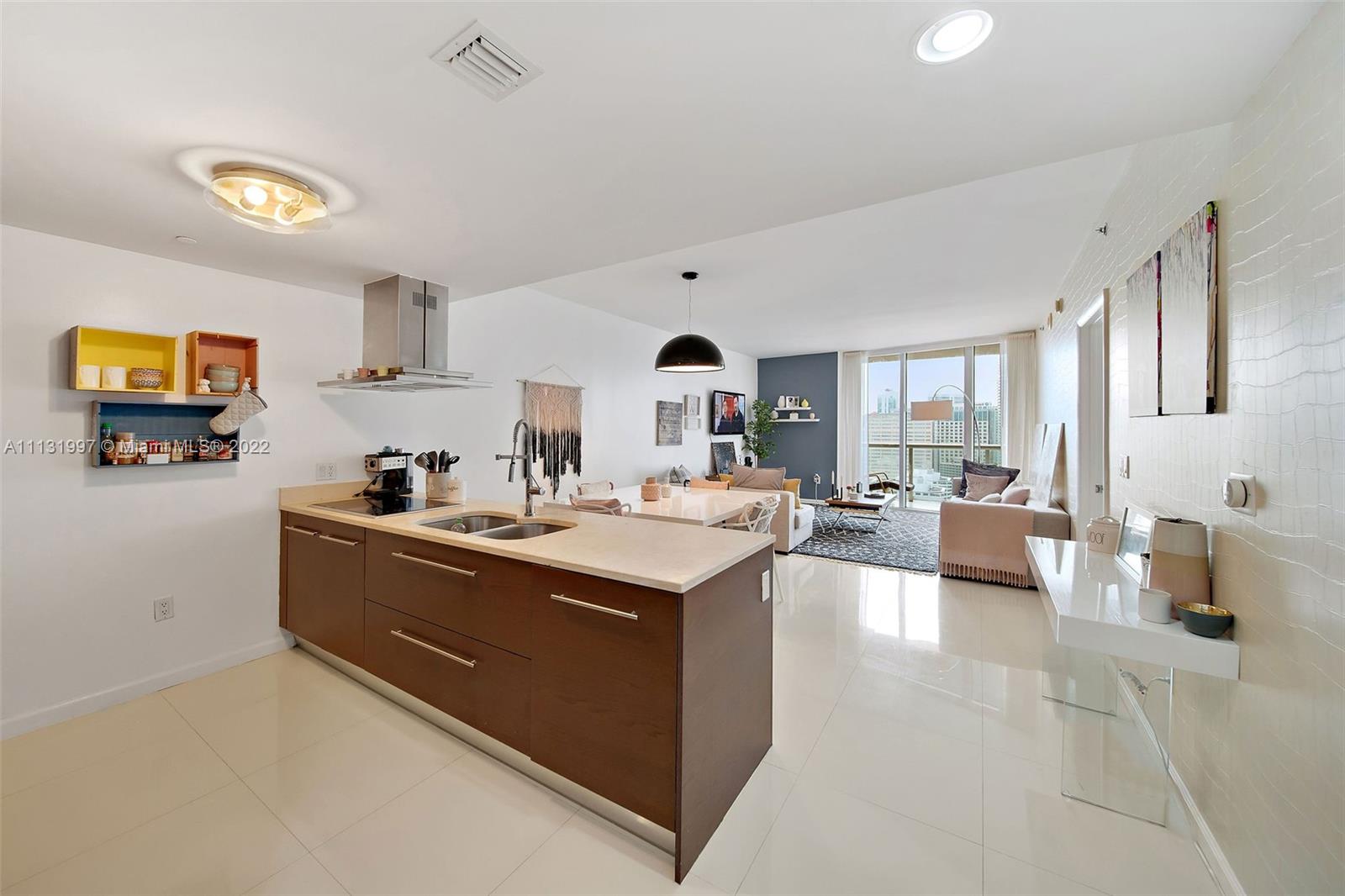 495 Brickell Avenue, Unit 3107 Miami, FL 33131 - Photo 2 of 41 a view of living room with furniture and a large window