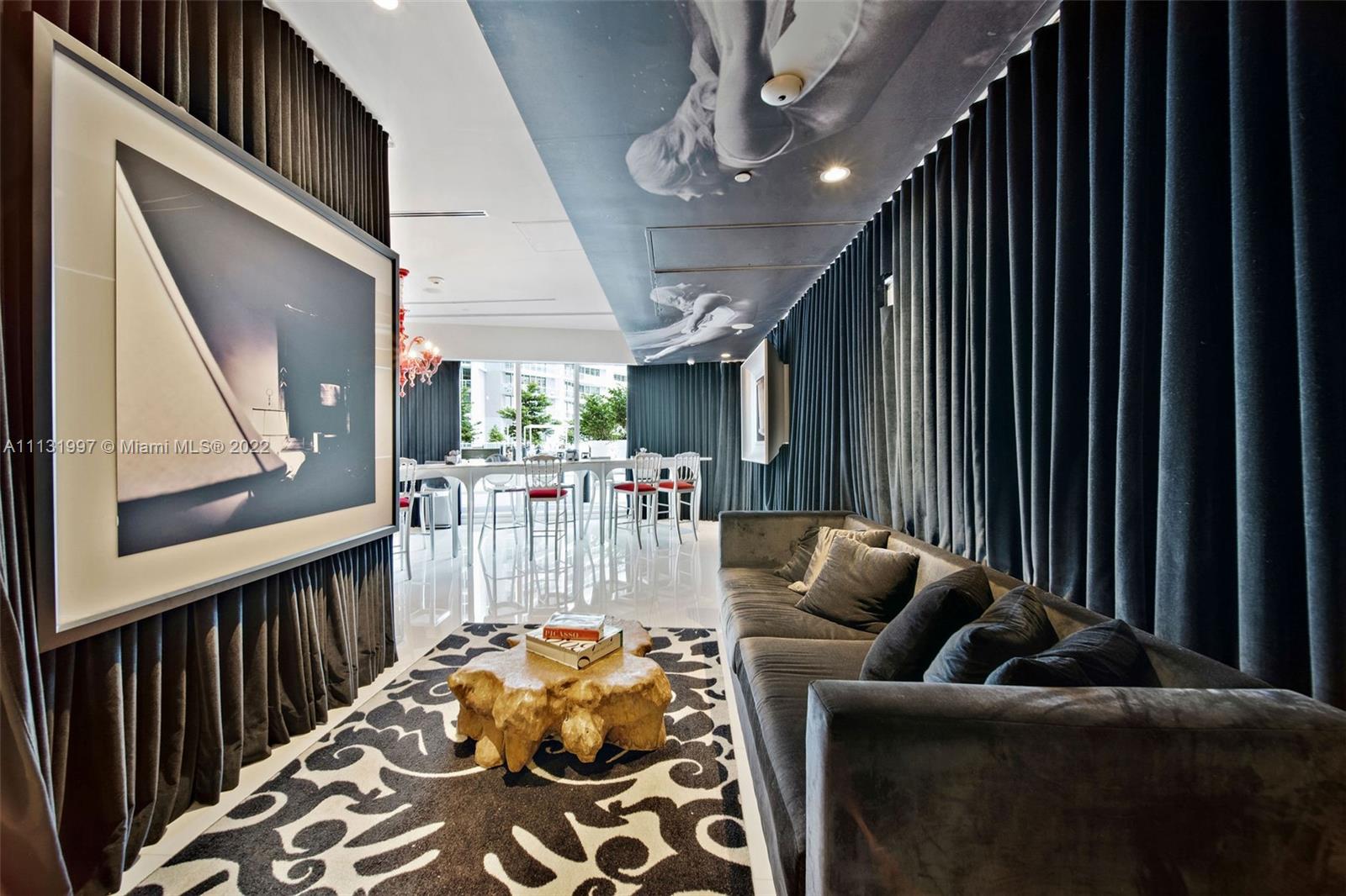 495 Brickell Avenue, Unit 3107 Miami, FL 33131 - Photo 34 of 41 a living room with furniture and a large window