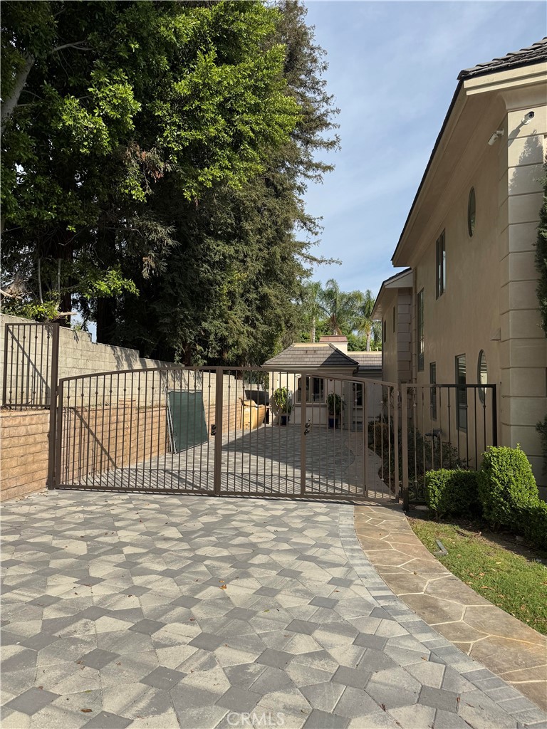 894 Fallen Leaf Road Arcadia, CA 91006 - Photo 28 of 28 a front view of a house with a garden