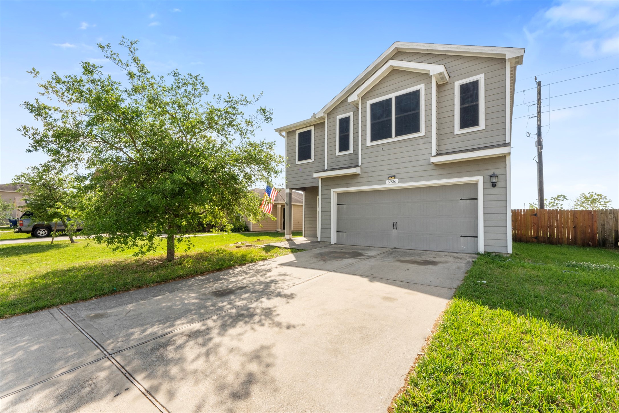 5926 Golden Cove Road Cove, TX 77523 - Photo 1 of 26 Front street view with double car garage