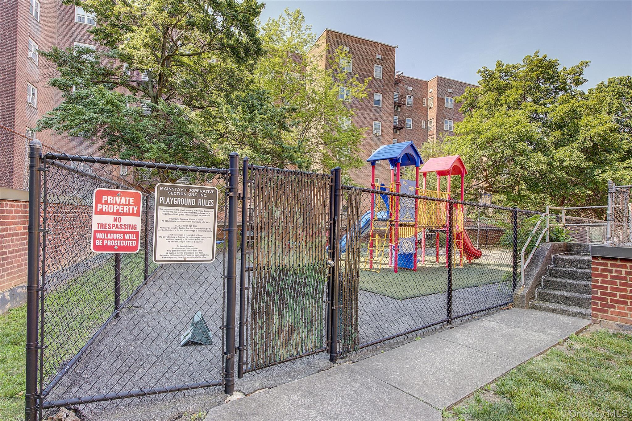 144-60 Gravett Road, Unit 4J Queens, NY 11367 - Photo 35 of 38 a view of outdoor space with wooden fence