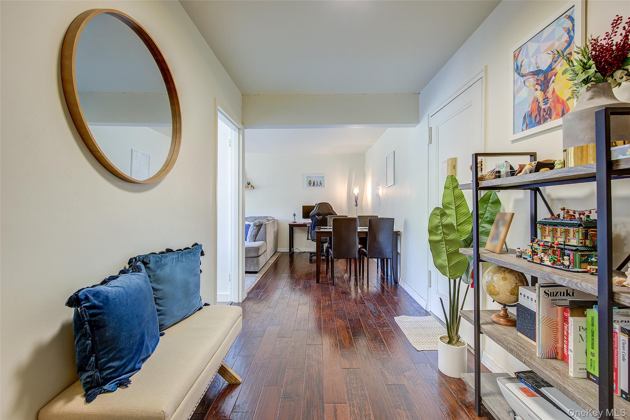 144-60 Gravett Road, Unit 4J Queens, NY 11367 - Photo 7 of 38 a living room with furniture and a wooden floor
