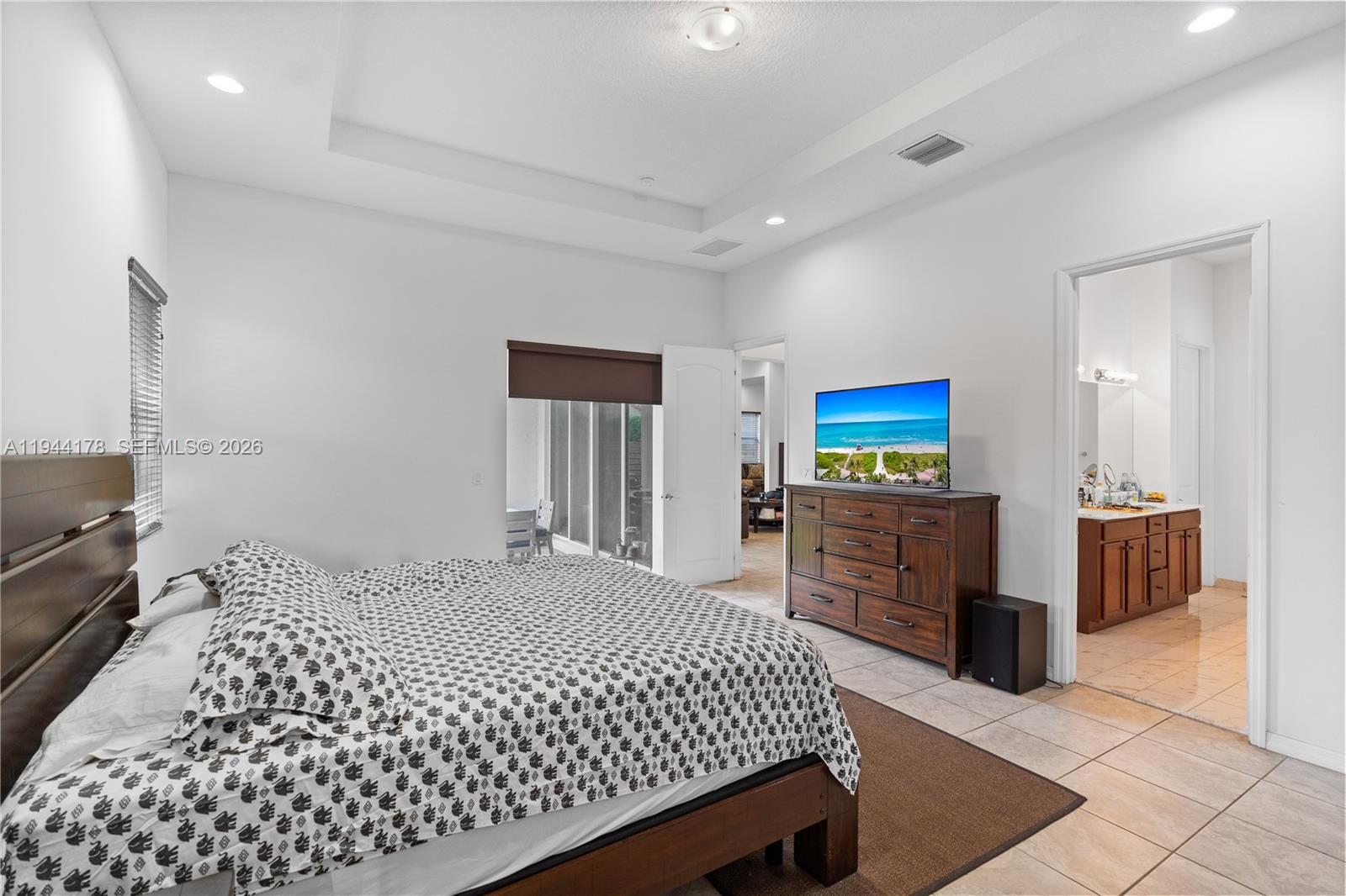 15102 Southwest 177th Terrace Miami, FL 33187 - Photo 17 of 38 a bedroom with a bed and furniture