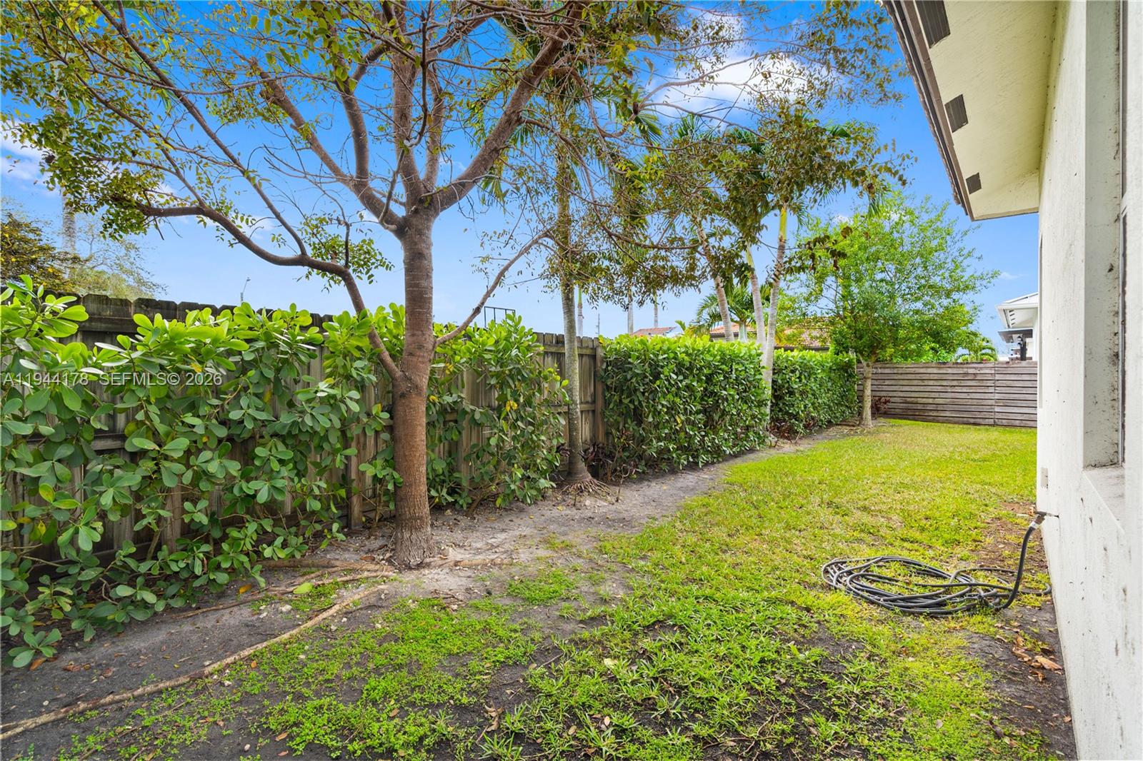 15102 Southwest 177th Terrace Miami, FL 33187 - Photo 33 of 38 a view of a backyard with potted plants