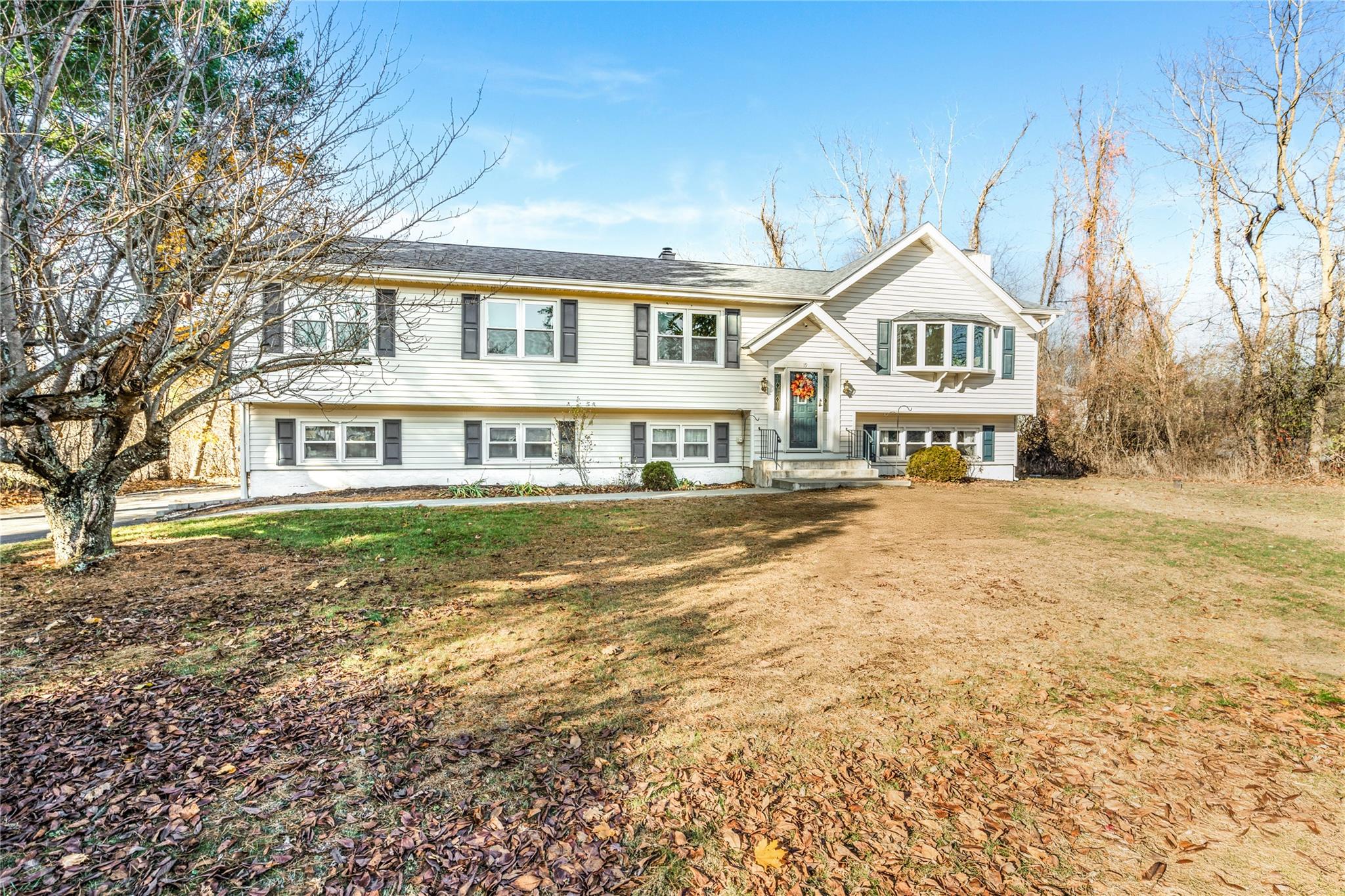 19 Gold Road Pleasant Valley, NY 12569 - Photo 1 of 1 a front view of a residential houses with yard and trees