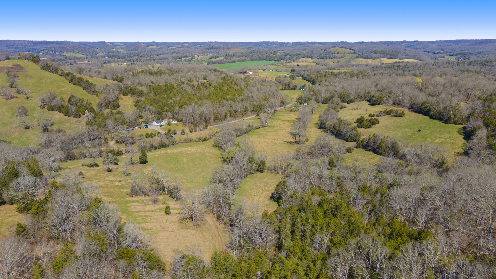 30 King Hollow Road Frankewing, TN 38459 - Photo 36 of 49 a view of a lush green hillside and houses