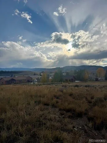 a view of a bunch of trees in a field
