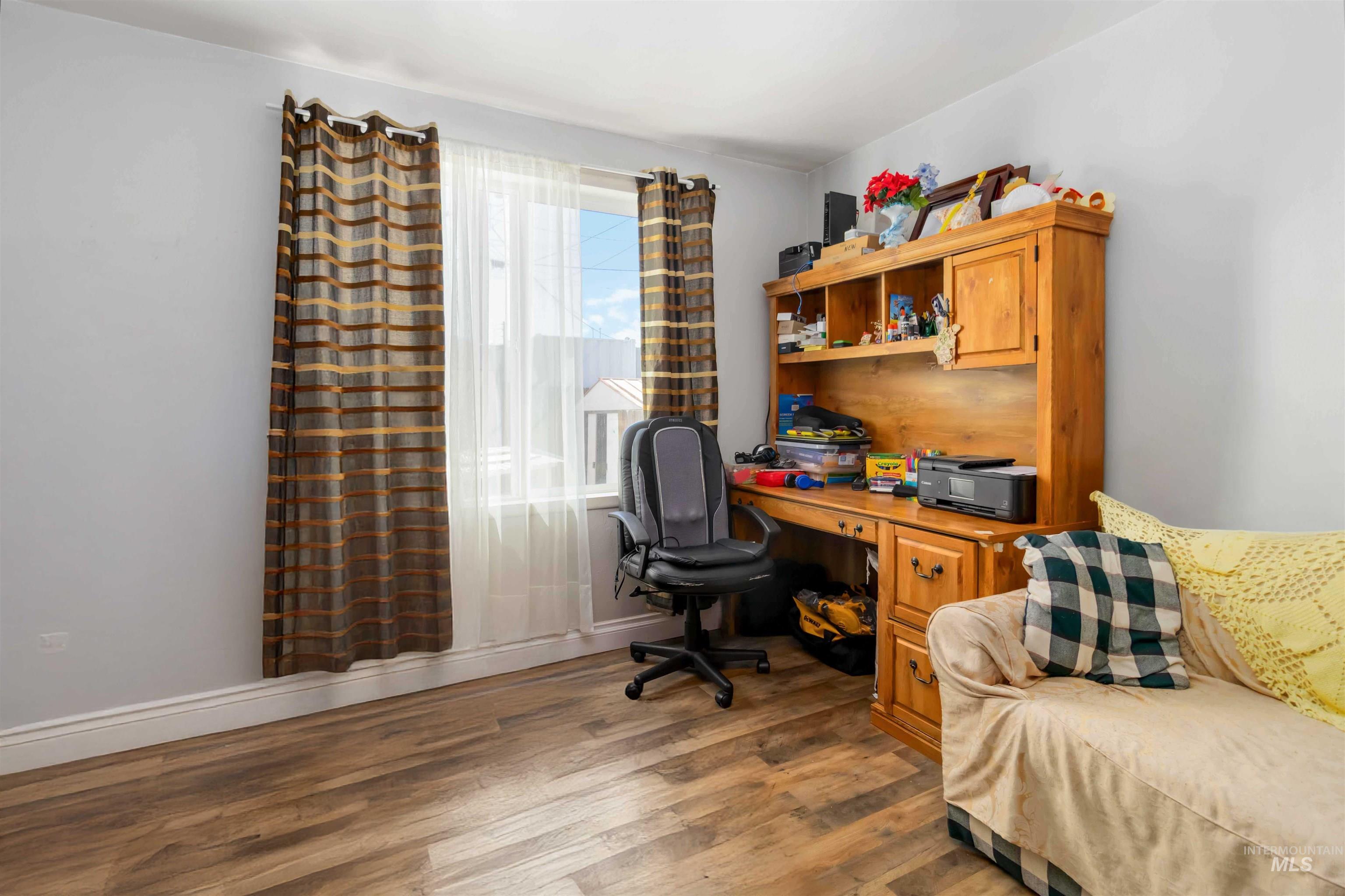 3869 Custer Drive Boise, ID 83705 - Photo 19 of 32 Office space featuring wood finished floors and baseboards