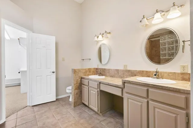a view of a livingroom with wooden floor and a window