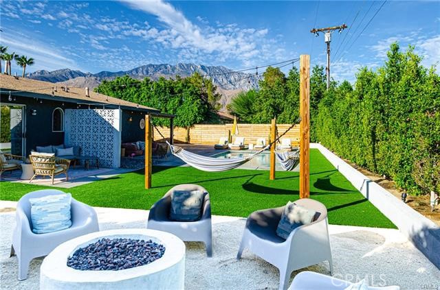 2770 East Ventura Road Palm Springs, CA 92262 - Photo 26 of 27 a view of a backyard with furniture and garden