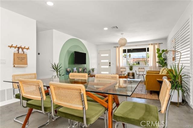 2770 East Ventura Road Palm Springs, CA 92262 - Photo 4 of 27 a living room with fireplace furniture and a large window