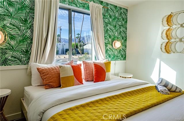 2770 East Ventura Road Palm Springs, CA 92262 - Photo 9 of 27 a bedroom with a bed and a window