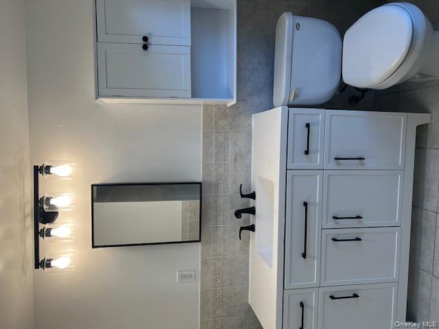 418 Christian Herald Road, Unit 4 Valley Cottage, NY 10989 - Photo 8 of 16 All new Vanity, Cabinet and Light fixture.