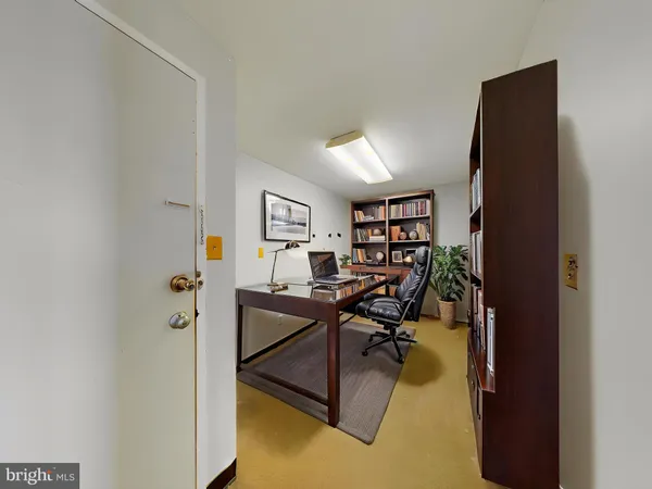 a view of a hallway with windows