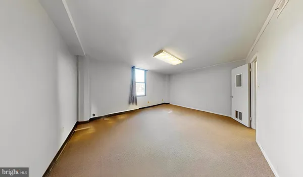 a view of an empty walk in closet