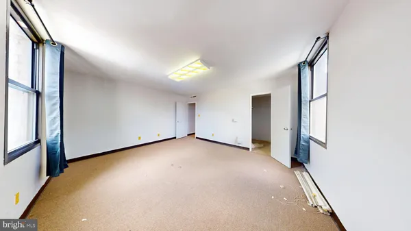 a bathroom with a bathtub and a sink