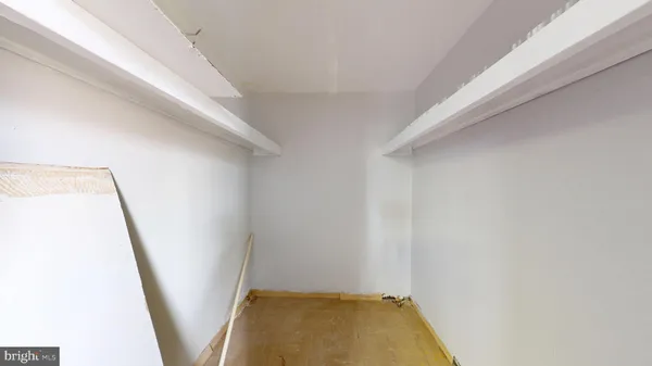 a bathroom with a sink and bathtub with shower