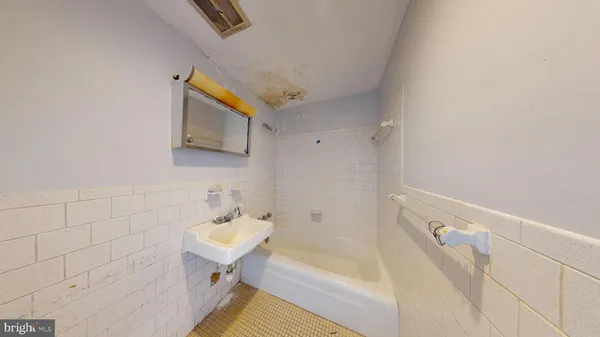 a picture of a room with a white wall and white walls